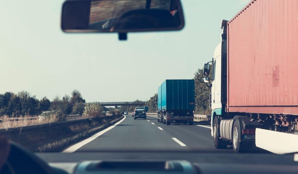 Trucks driving on a road