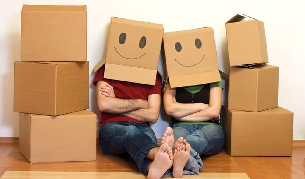 Male and female with boxes