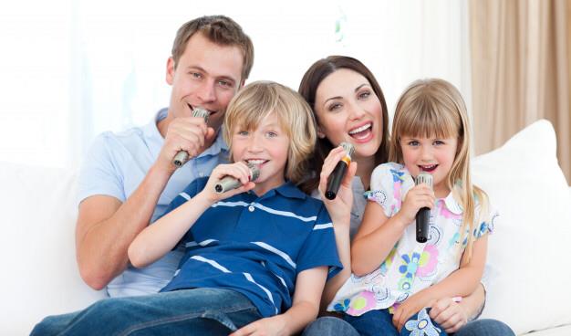 Family sing with microphones