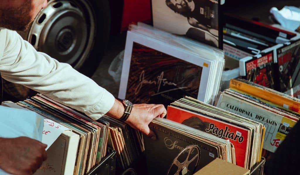 Man buying records at a yard sale