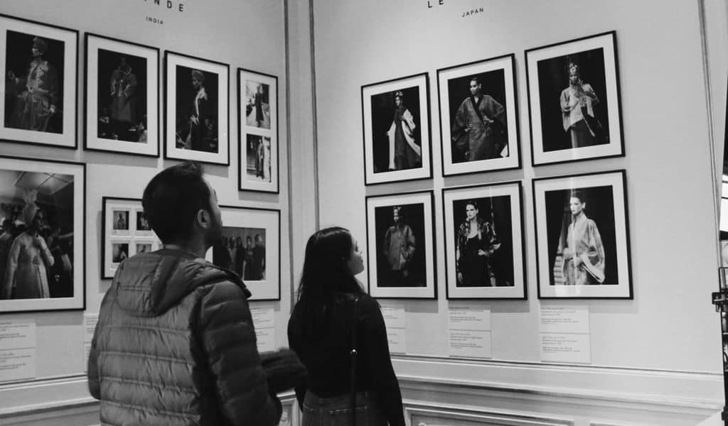 Framed portraits on a black and white background