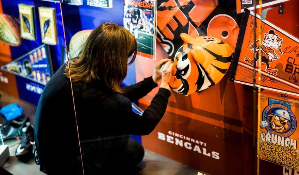 A fan admiring a Bengals sign in Cincinnati