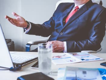 Moving broker wearing a suit