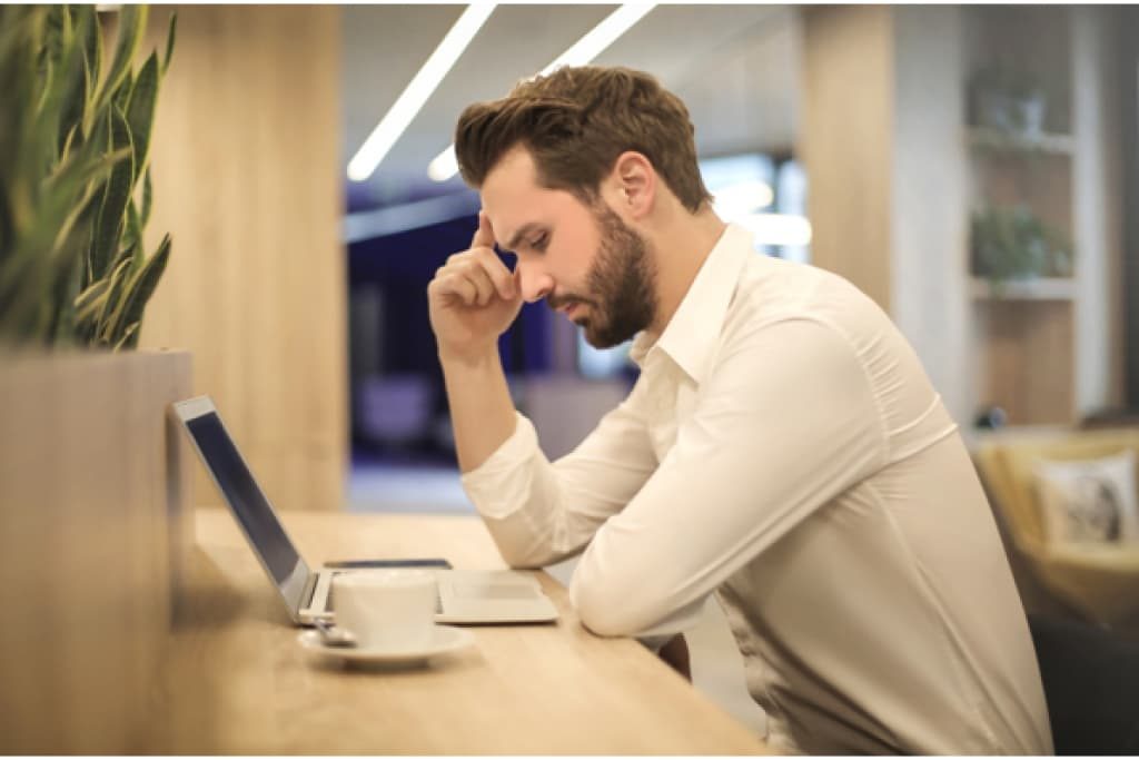 Young male thinking about his upcoming relocation