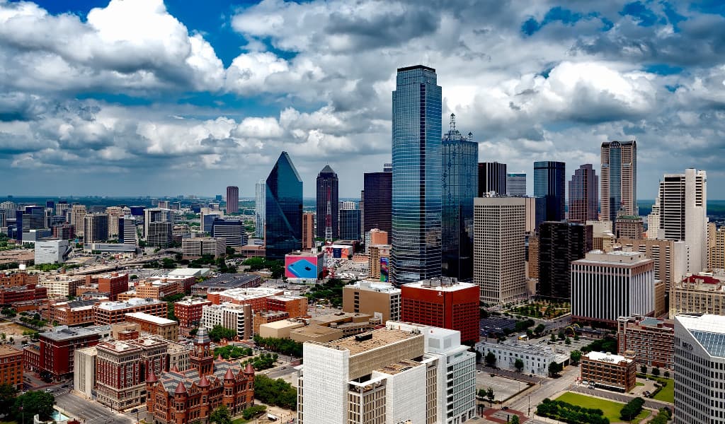High rise buildings in Dallas with clouds overhead
