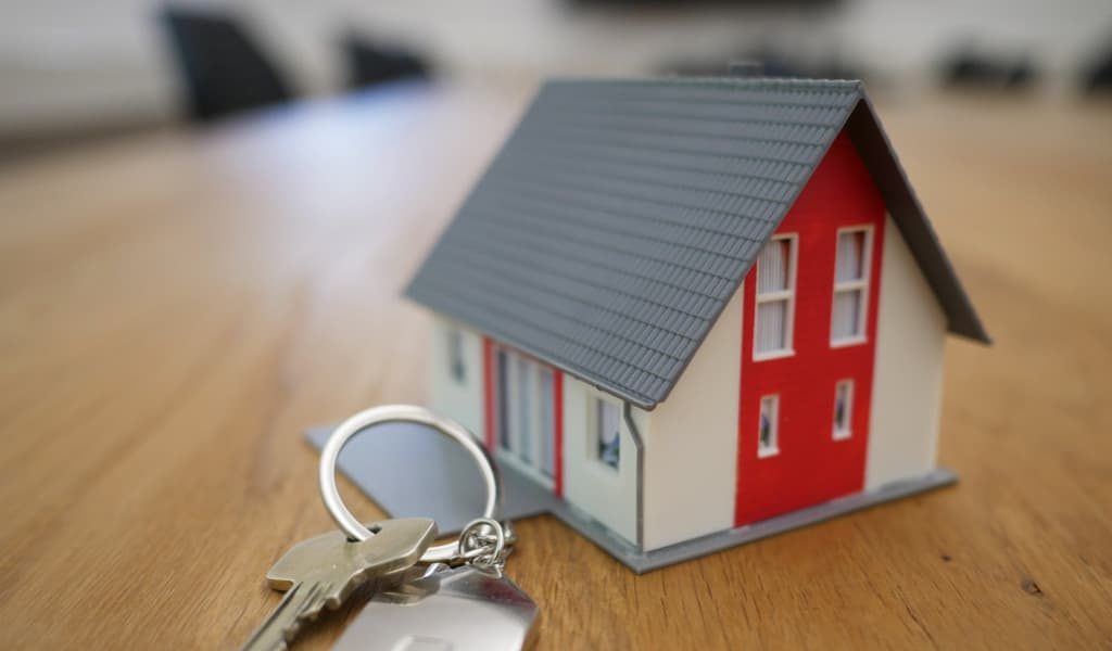 A key and miniature house