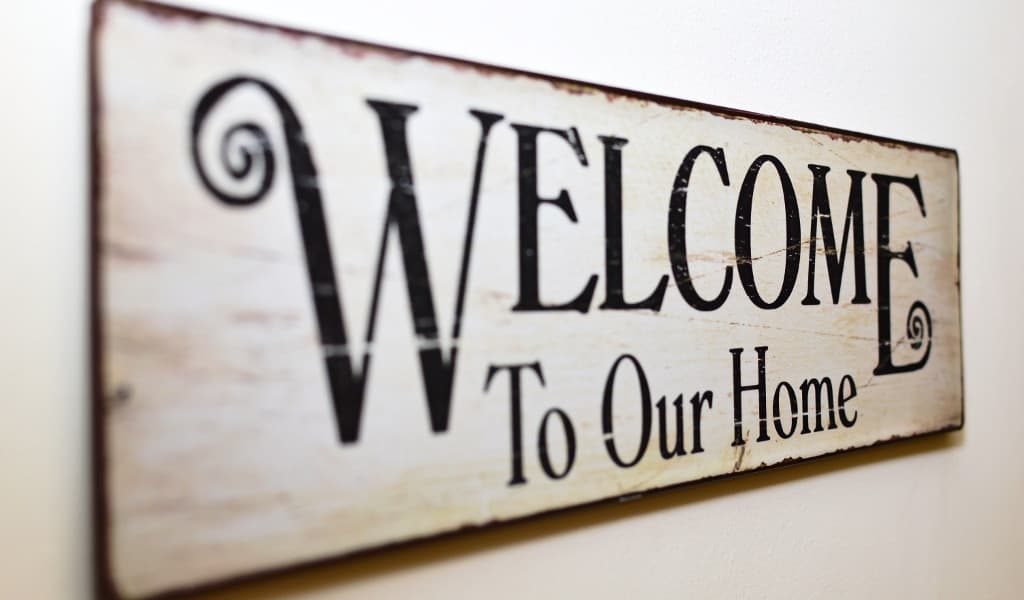 Off-white ‘Welcome to our home’ wooden sign