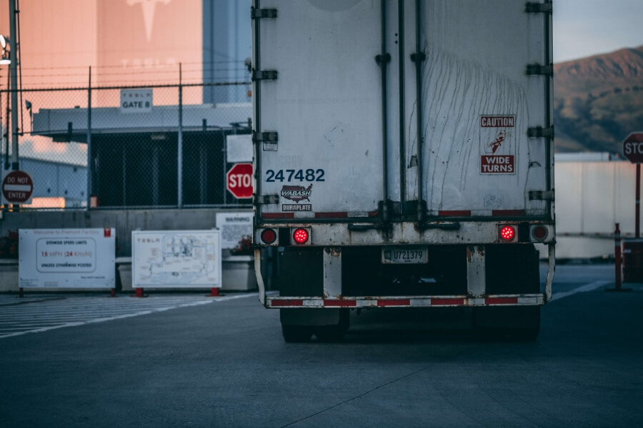 Moving truck on road.